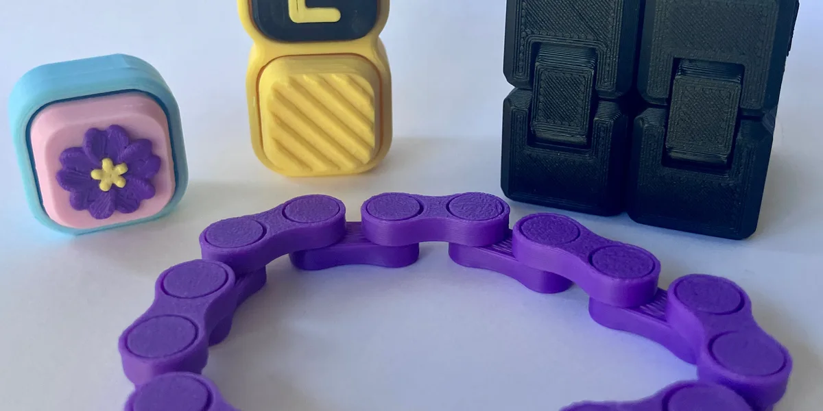 Teenager using a discreet fidget toy while studying