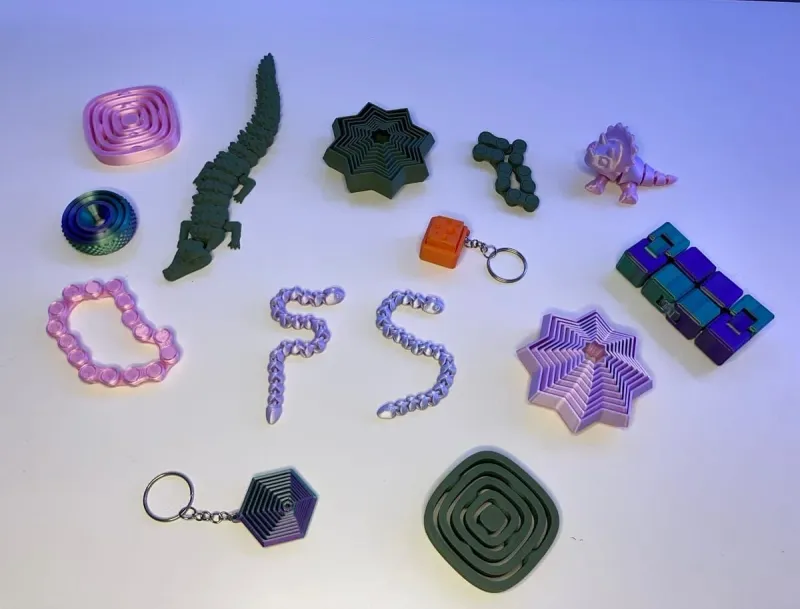 Fidget Street product selection featuring articulated toys, spinners, and stress relievers